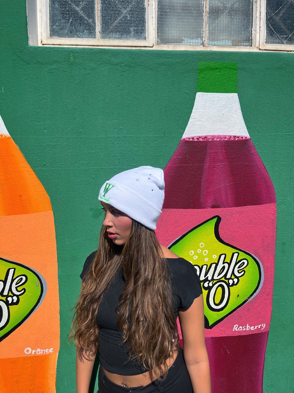 White beanie, side view